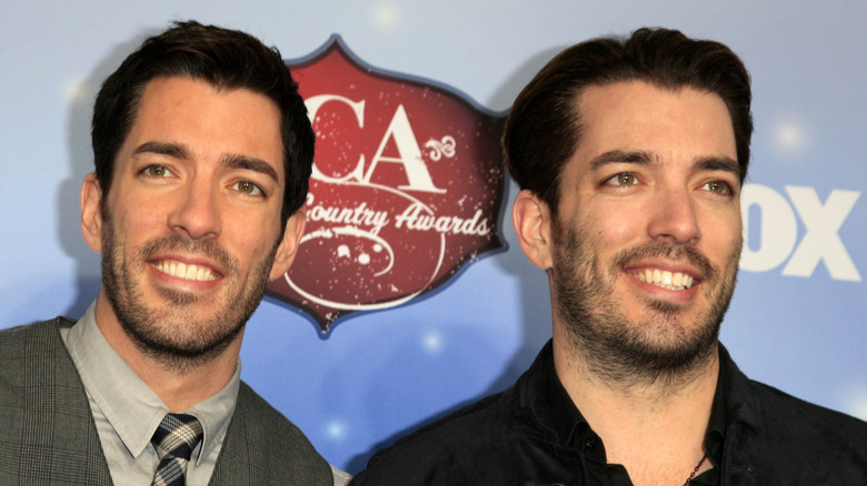 Drew and Jonathan Scott at event