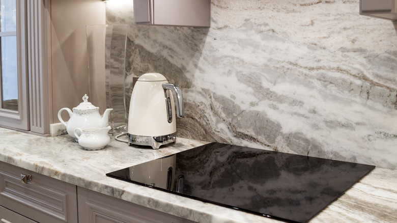 light quartz countertop with dark cabinets