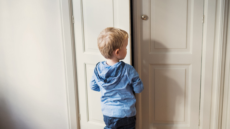 Child facing closet