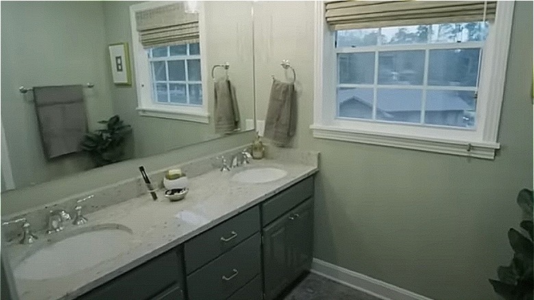 green vanity in bathroom