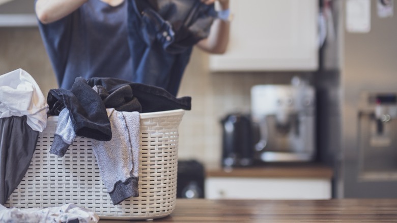 Laundry hamper on kitchen counter