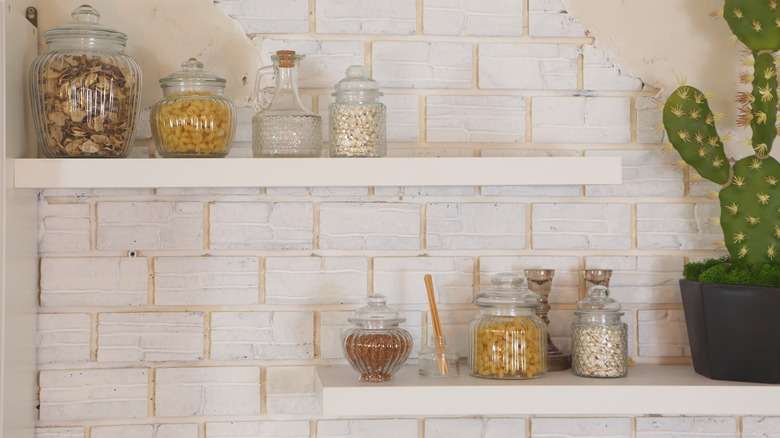 Spice storage shelves in kitchen