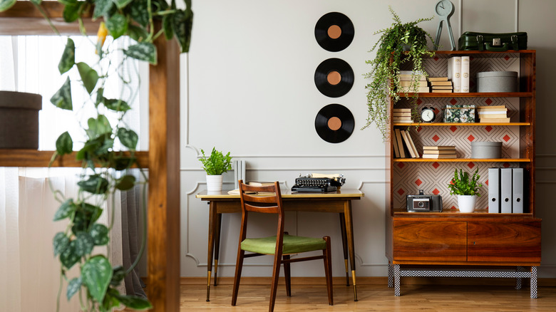 mid-century walnut office with plants