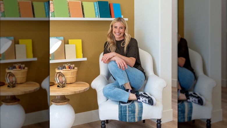 Jasmine Roth sitting on chair