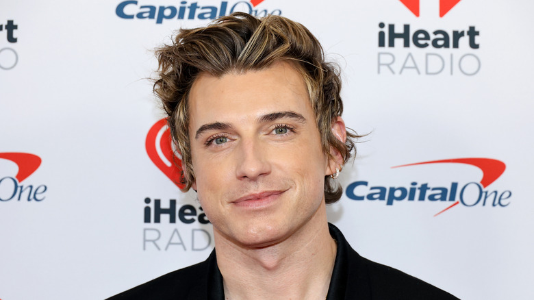 Jeremiah Brent smiling at a red carpet event