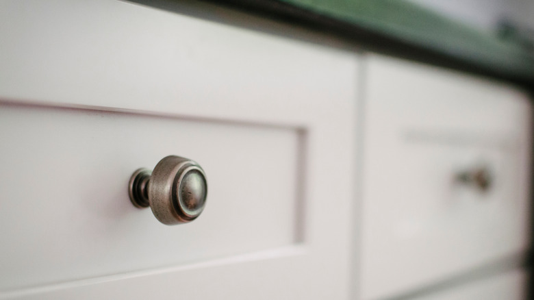 shaker drawers with brass knobs