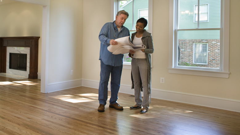 Woman talking to home inspector 