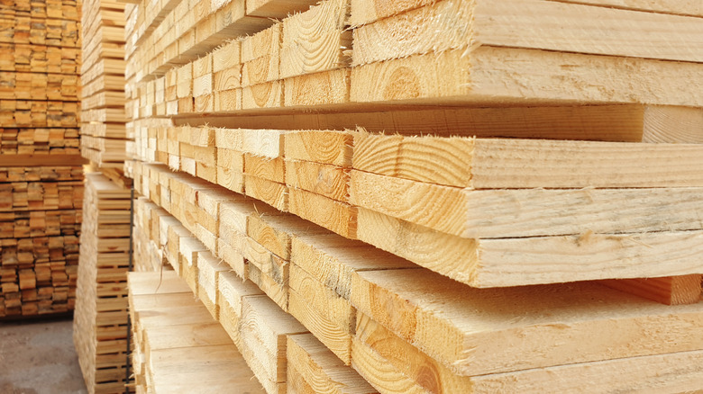 Lumber stacked in warehouse