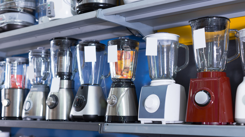 shelves with kitchen blenders