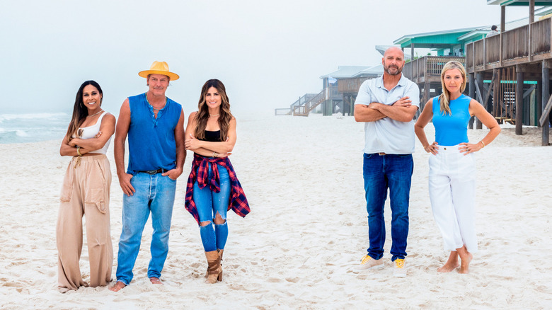 Battle on the Beach hosts smiling on beach