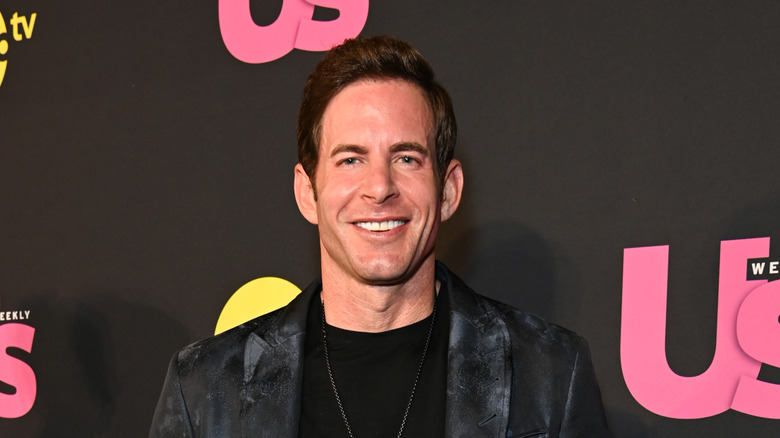 Tarek El Moussa smiling on the red carpet