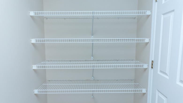 Wire shelves in empty closet