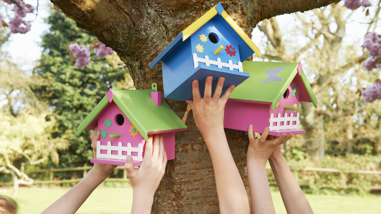 three bird houses