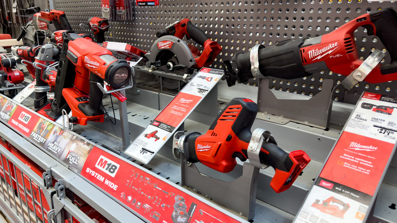 Multiple Milwaukee tools on display at a retail store