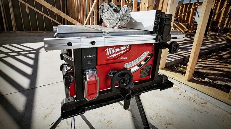 Milwaukee battery-powered table saw at an outdoor job site