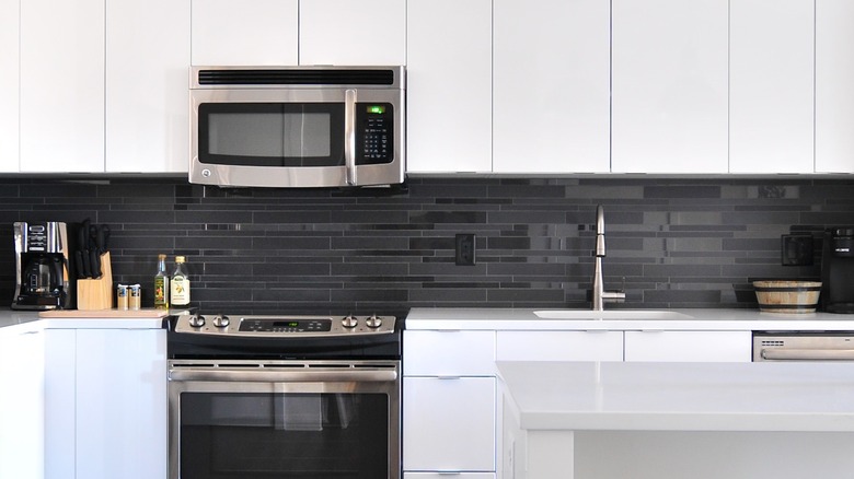 Grey tiled kitchen backsplash