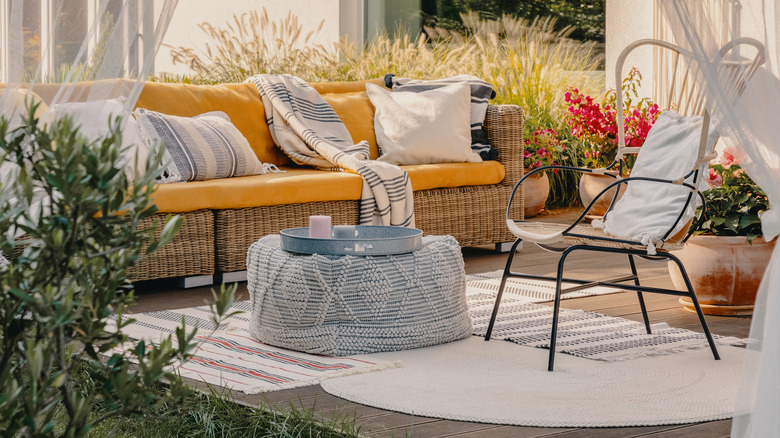 Layered patio accent rugs