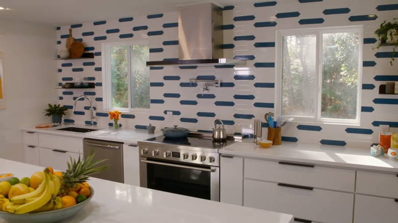 Mid-century kitchen with a statement backsplash.