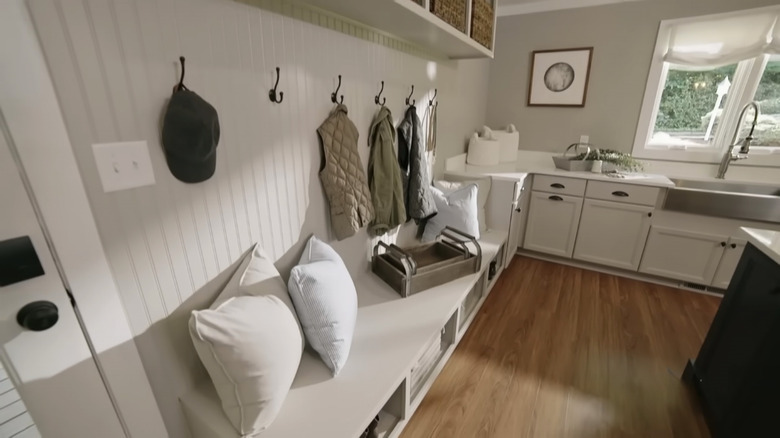 Storage bench in gray mudroom