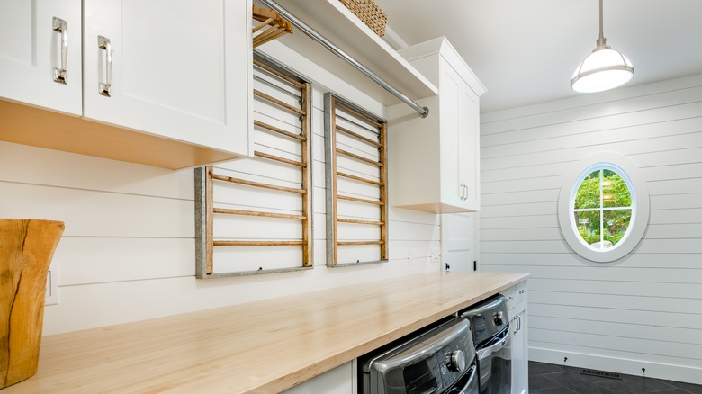 laundry room with hanging rod