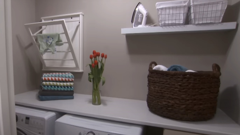 small laundry room with countertop