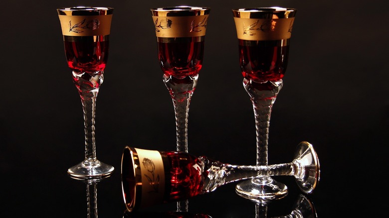 red and gold drinkware