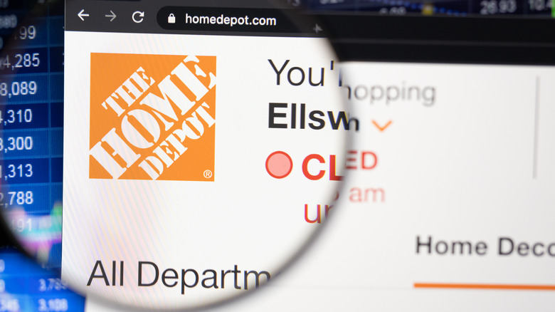 Magnifying glass over Home Depot sign