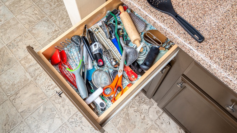 unorganized kitchen drawer