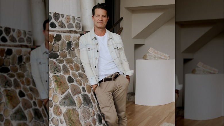 Nate Berkus and stone wall