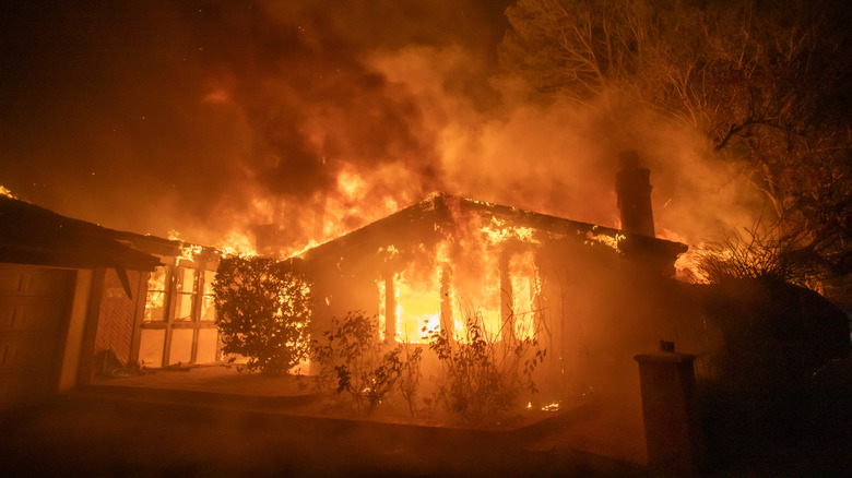 A house engulfed in flames in Palisades, California