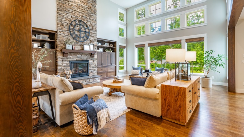 living room with brick fireplace