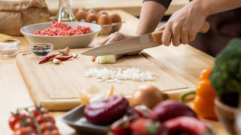 Person chopping vegetables 