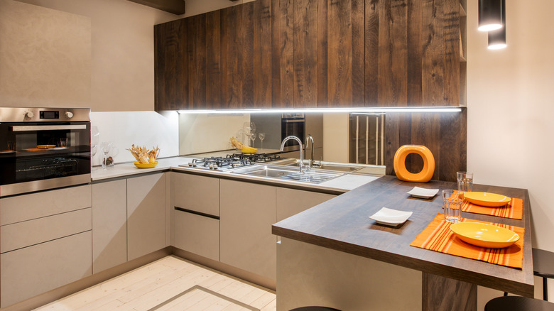 modern kitchen with beige cabinets