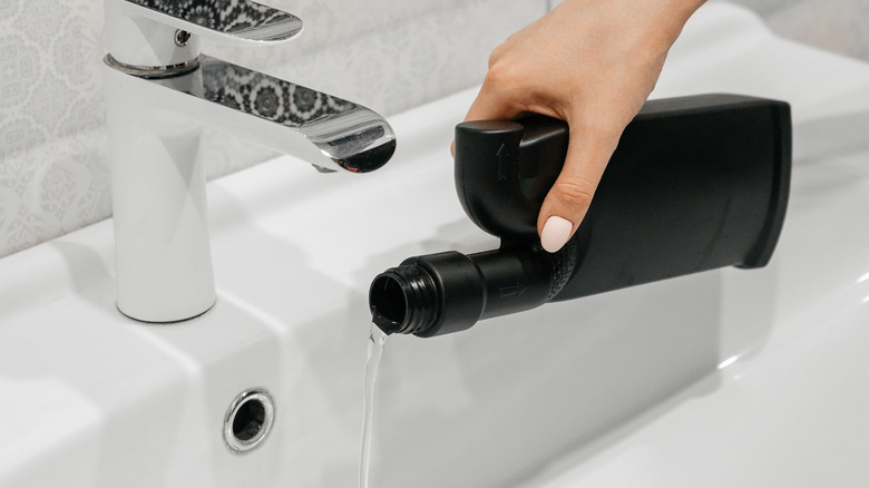 Drain cleaner poured down a sink