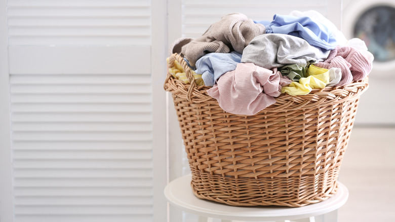 Wicker basket with dirty laundry 