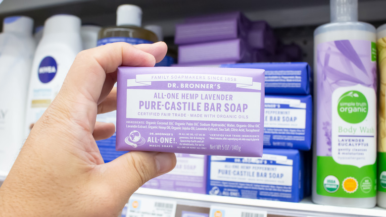 Hand holding Castile soap bar