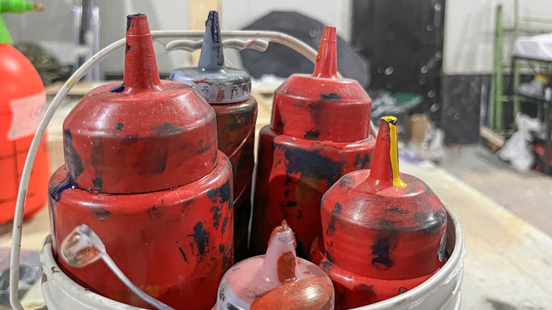 Ketchup bottles with paint