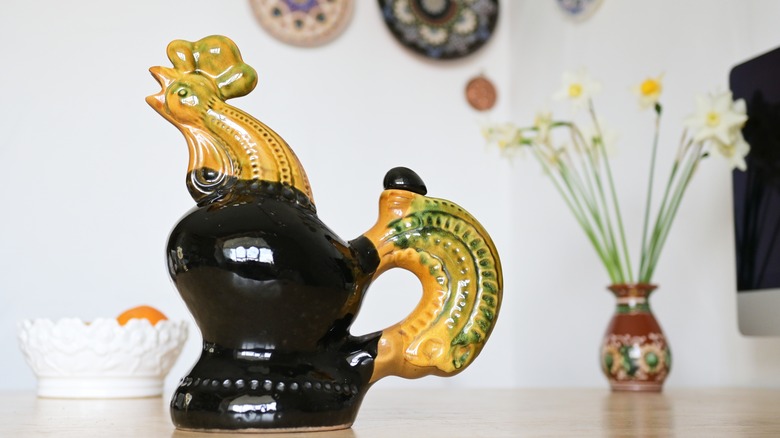 ceramic rooster statue in kitchen