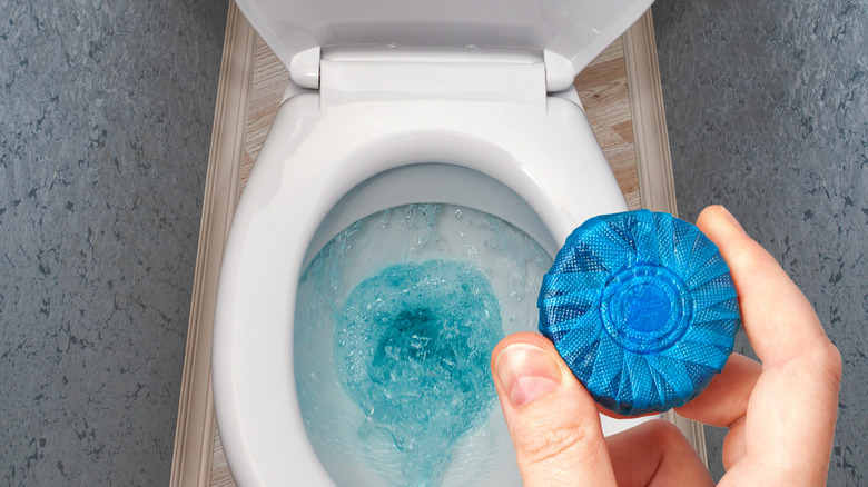 blue tablet toilet bowl