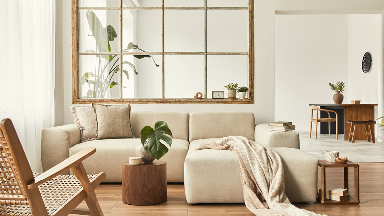 warm grey room with brown couch 