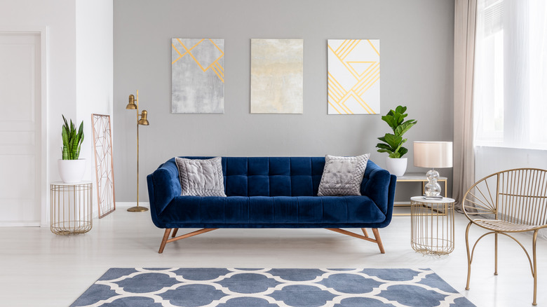 blue sofa in neutral room