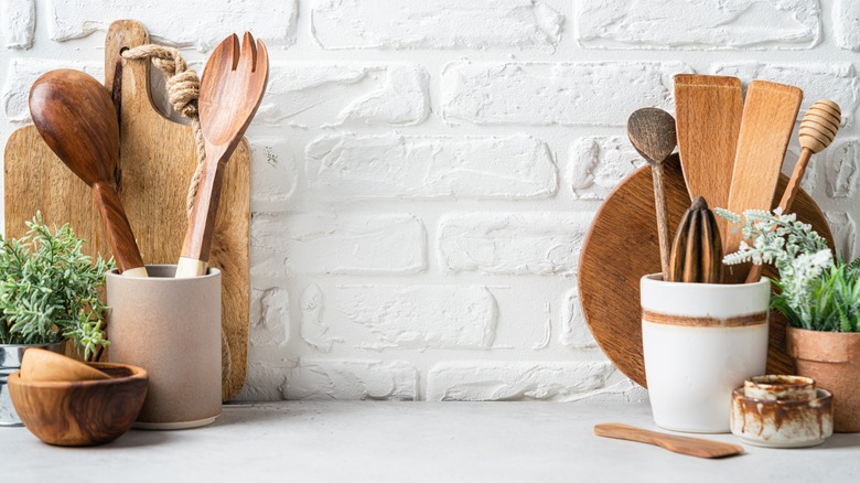 wood kitchen utensils on counter