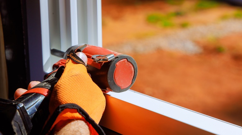 handyman installing window