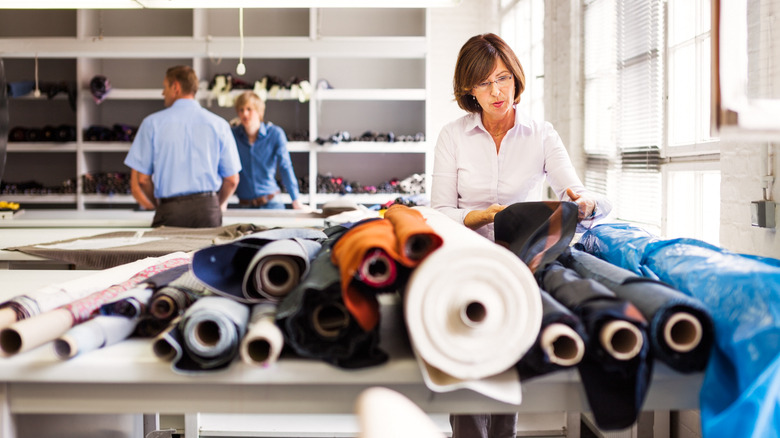 people selecting fabric 