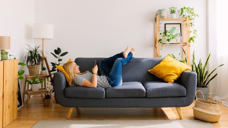 teen hanging out on the couch