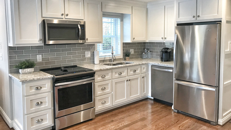 Kitchen with sink under window