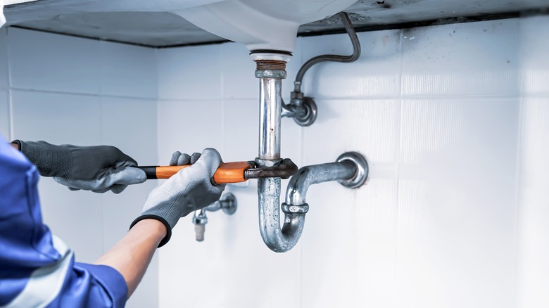 repairing plumbing