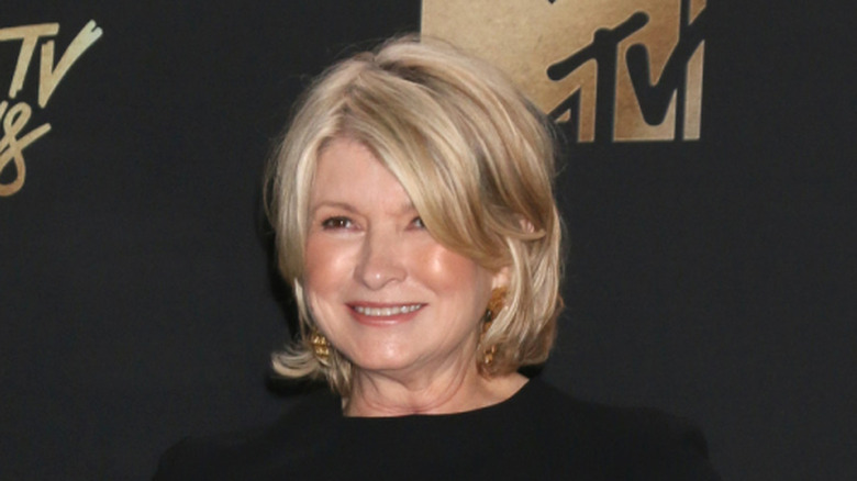 Martha Stewart smiling for a photo at an awards ceremony