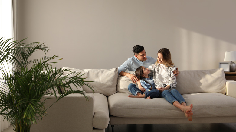 Family sitting on a couch