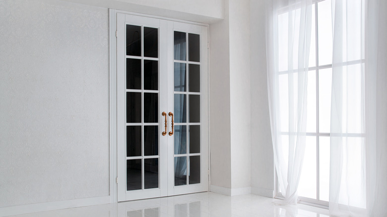 french door in white room